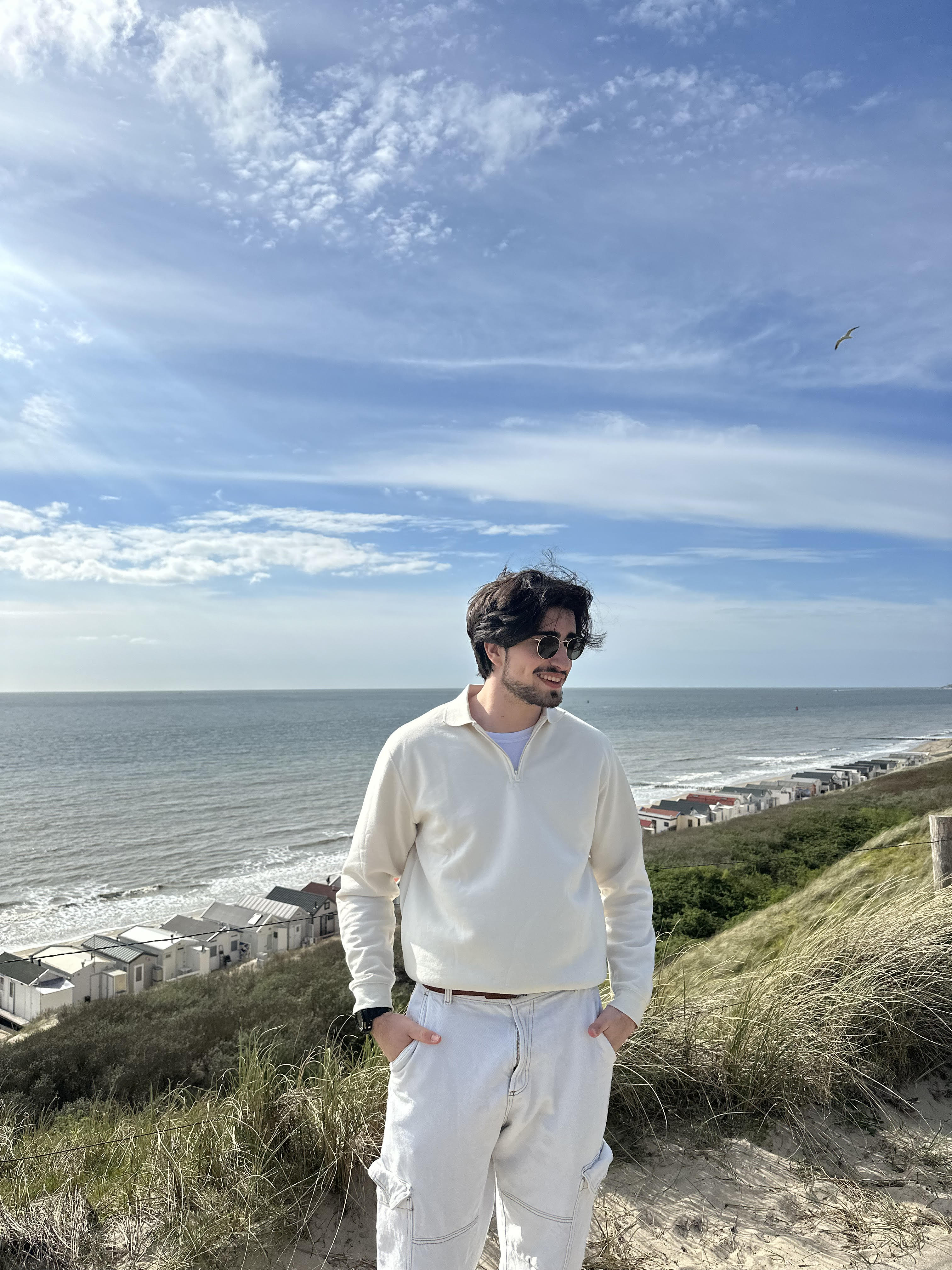 Ofek standing by the sea